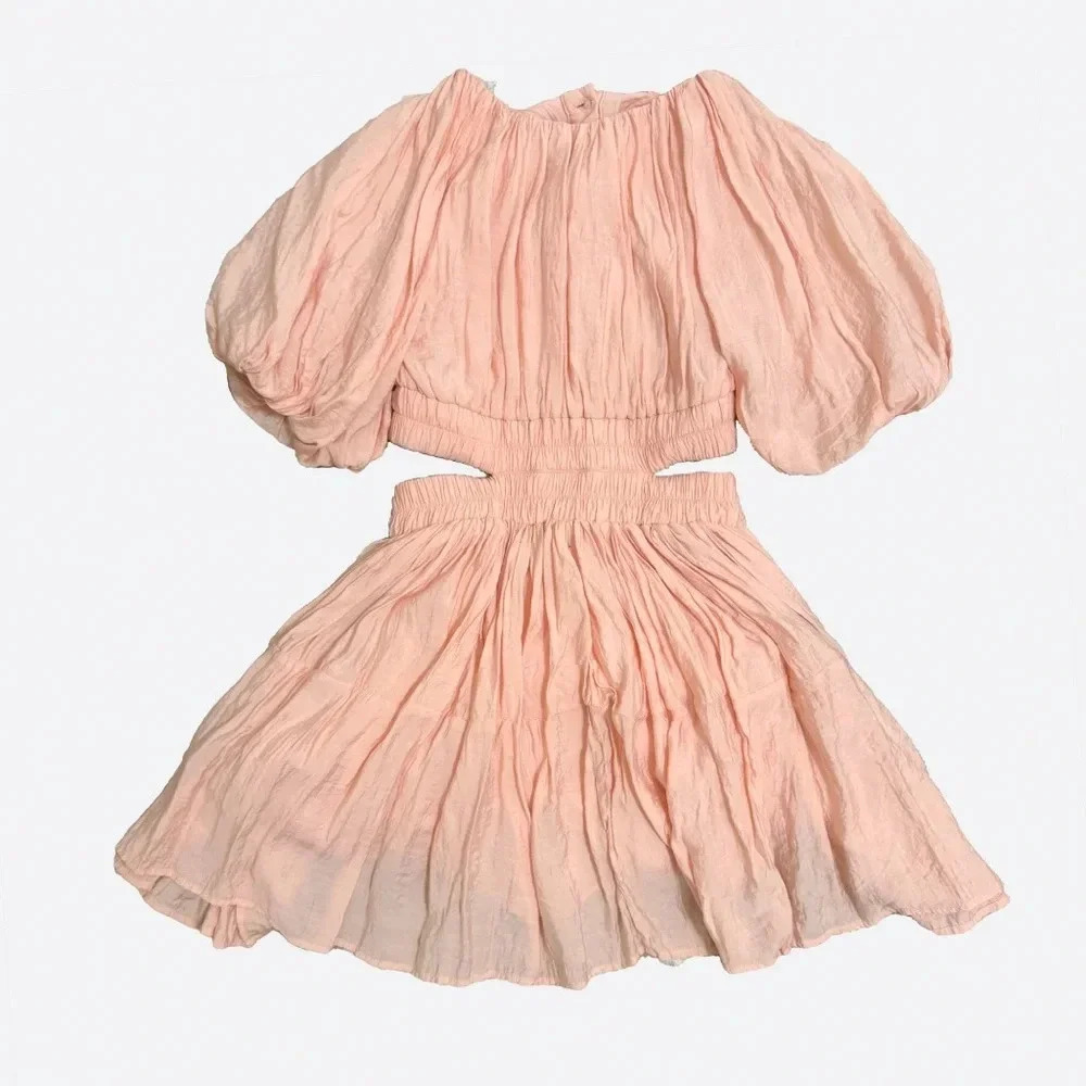 Pink puff sleeve mini dress with open back/cut out
